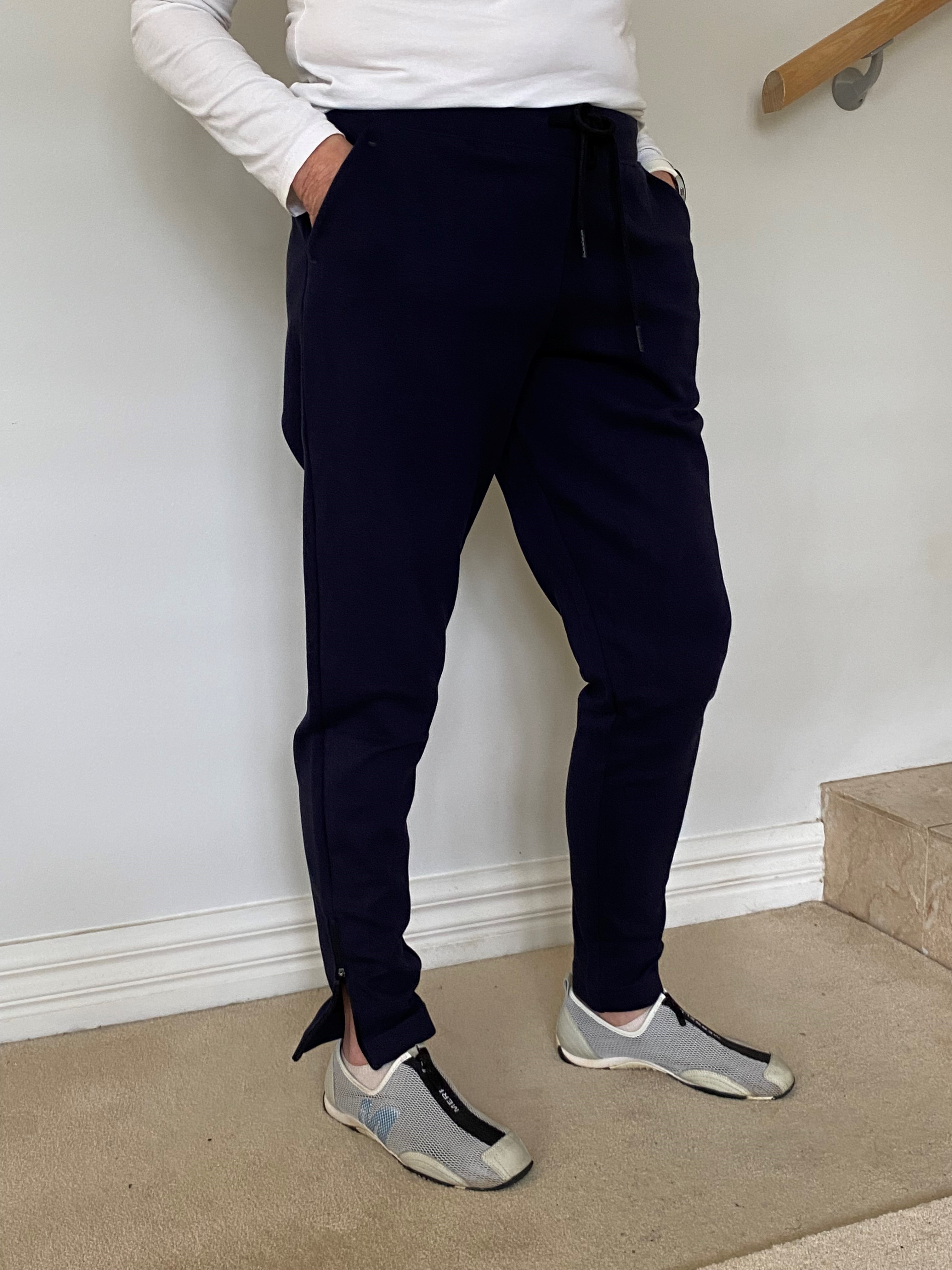 Track pants with zip front